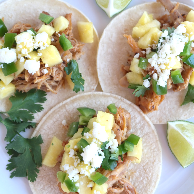 Fiery Pulled Chicken Tacos are full of heat and flavor! They're easy, delicious and are a great way to spice up your family dinner or feed a crowd.
