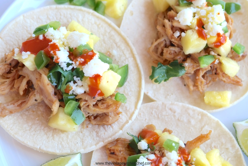 Fiery Pulled Chicken Tacos are full of heat and flavor! They're easy, delicious and are a great way to spice up your family dinner or feed a crowd. 