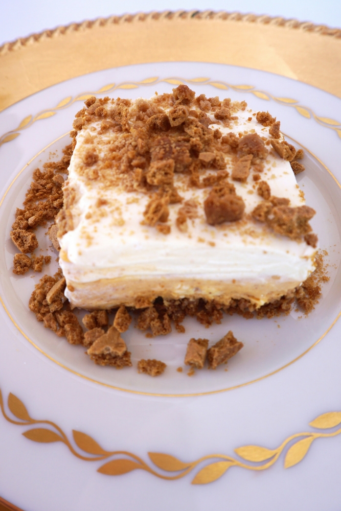 Gingersnap crust makes all the difference with this no-bake dessert. Layers of pumpkin spice cheesecake, pudding and whipped topping on a gingersnap crust.